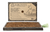 The Bark Potty bark potty pad displayed in front of its kraft-paper packaging on a white background.