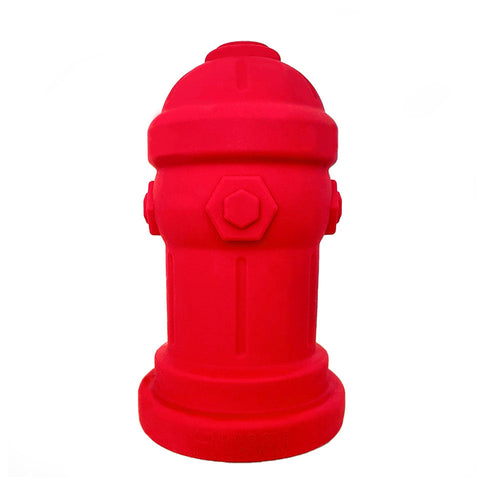 Red silicone fire hydrant potty training accessory for dogs on a white background.